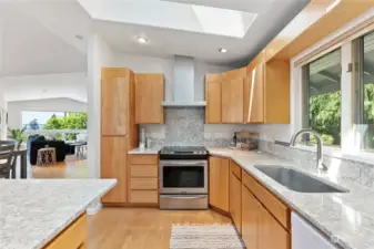 Beautiful granite and newer appliances create a lovely chef’s kitchen.