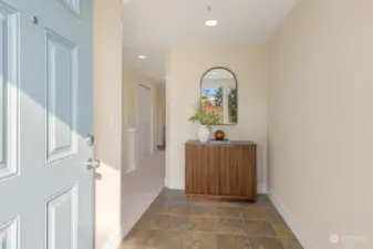 Generous entryway sets the tone for the bright and airy interiors.