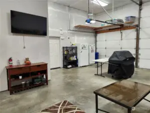 Inside garage showing large screen tv