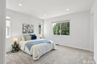 Primary Bedroom with Ensuite and walk-in Closet - Located on Upper Level