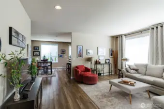 View showing the dining room area ahead. New luxury vinyl flooring through main living areas.