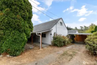 Larger trees and fencing keep this property private and serene. Carport for covered parking.