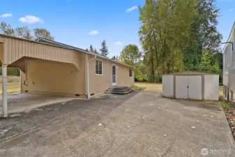 Patio view with storage shed