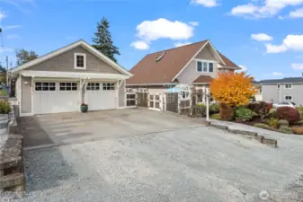 Side view of house showing detached 2-car garage/shop