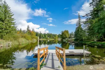 Smith Lake is conveniently situated close to the entrance of the charming community of Camaloch, offering visitors a tranquil and scenic experience.