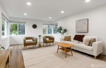 Large living area with lots of natural light