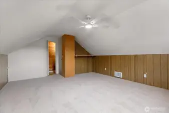 Primary bedroom with attached private 1/2 bath