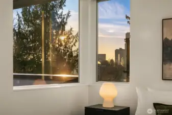 Primary suite with remote blinds & City outlook.