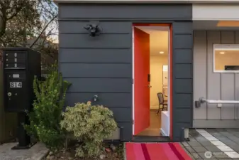Entry floor Guest suite with wet bar + walk in closet.