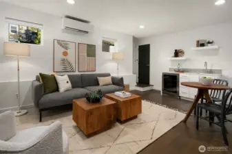 Entry floor Guest suite with wet bar + walk in closet.