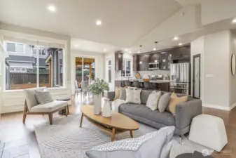 View of living space and open style kitchen