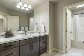 Full bathroom with double vanity upstairs
