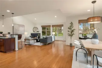 The main level features this true great room with soaring vaulted ceilings and a wonderfully versatile floorplan.