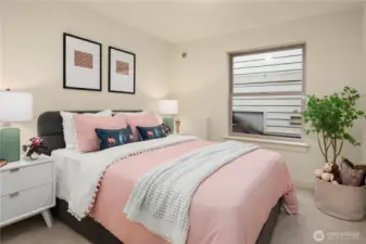 Bedroom three of four. Three bedrooms plus a den are on the same floor with the fourth bedroom in the daylight basement.