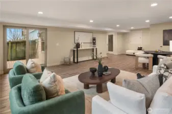 Looking back towards the hallway the fourth bedroom is around the corner and the second laundry is through the glass door for a possible MIL level.