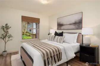 The fourth bedroom is located on the lower level with a nice outlook to the backyard.