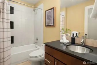 The fourth bathroom is located downstairs again with heated floors and wonderfully appointed.