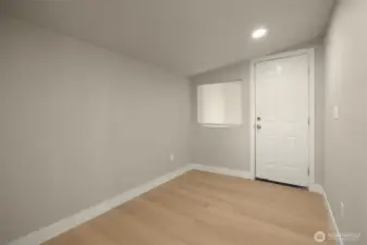 Unique office space around the dining corner. Door leads to side yard.