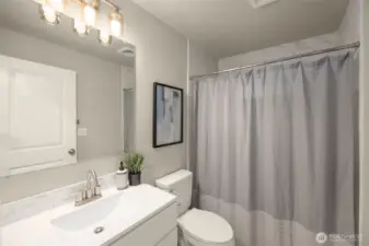 Full bathroom on main level (hallway).