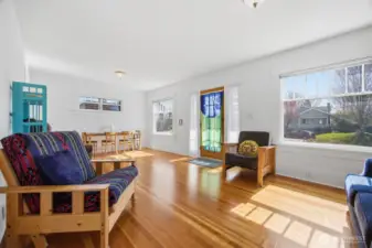 Looking across the spacious living and dining areas at the front of the home.