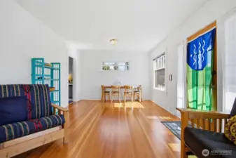 Another view of the open and spacious rooms with the beautiful fir wood floors.