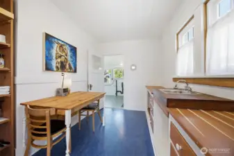 Another view of the kitchen toward the utility room (no washer and dryer were ever installed, but the wiring and plumbing is there.