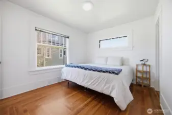 The bedroom also has the gorgeous fir floors that have been refinished so nicely.