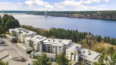 As you watch the traffic slow on the Tacoma Narrows, you'll be ever so grateful you live on this side of the bridge!  Individual heat pumps are on the roof and provide air conditioning when extremely hot days require it.  After all, we face due west.