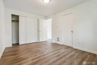 Another angle of primary shows door to full bath