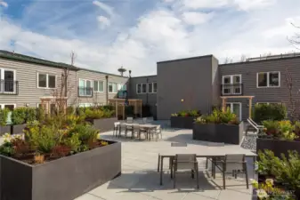 Outdoor deck is mere feet from your front door.