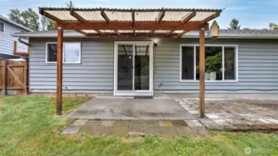 You will love having a covered patio in this backyard for year round enjoyment.