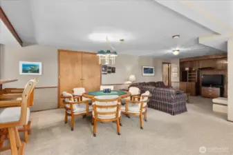 the doors behind the game table is the murphy bed