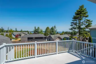 Deck off upper living area. Looking east toward Penn Cove.