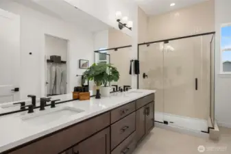 Primary Bathroom, dual vanity and shower. Photos are for illustrative purposes