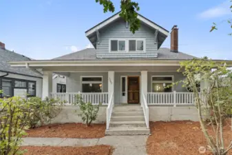 This classic North Tacoma craftsman sits above the street, nestled in native trees and bushes