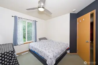 Second bedroom on the upper floor.