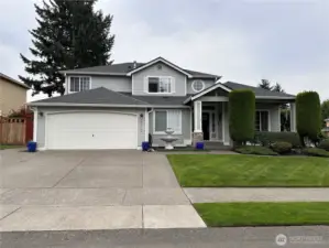 Home features an extended 3 car extended driveway with sidewalk to side gate that goes to the backyard patio.  The house has a tandem 3 car garage with access door to the backyard.