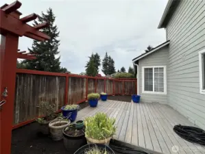 Side deck on the west side of the house on the cul-de-sac side that has a gate.  Deck large enough to put a spa.