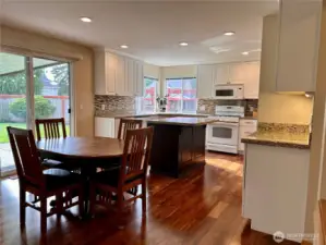 Kitchen island can seat 2 and an eat-in area that can seat up to 4-6