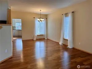 View of the Dining Room & Living room from the foyer with 9 foot ceilings.