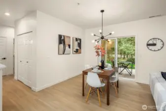 sliding doors from dining area to the cutest patio overlooking the HOA maintained greenspace. A darling spot to enjoy morning coffee, or evening sundowners. Storage closet off patio too.