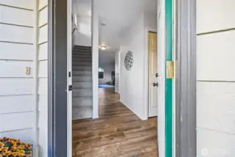 An inviting entry says “welcome home” before you even step inside. Fresh paint, clean lines, and coastal charm set the tone for effortless living on Whidbey Island.