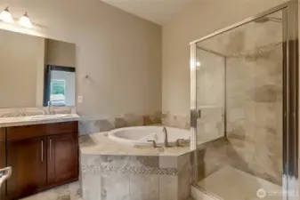 Primary suite features a grand 5 piece bathroom.
