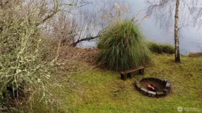 Enjoy an outdoor fire while gazing at the lake..