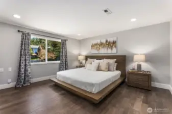 The primary bedroom with a room for comfy sitting area. This floor plan offers so much flexibility.