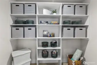 This game room closet is thoughtfully organized with labeled bins and baskets, making it easy to store board games, accessories, and activity gear. With its clean layout and playful touches, it’s a practical hub for keeping entertainment essentials tidy and accessible.