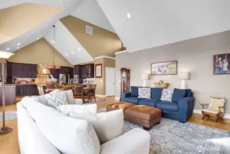 Designed for gathering, this living space with many layers of vaulted ceilings is where holidays, laughter, and quiet evenings naturally unfold.