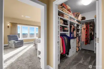 Enter the primary suite at the end of a short hallway as you come in to unwind, put things away, and curl up with a good book in the spaciousness of your bedroom retreat.