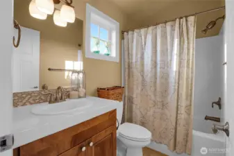 The second story full bath is available for both upper level bedrooms and upper living room.