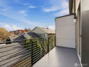 Outdoor Balcony facing east plenty of space of outdoor seating, bbq grill, and just relaxation with privacy around